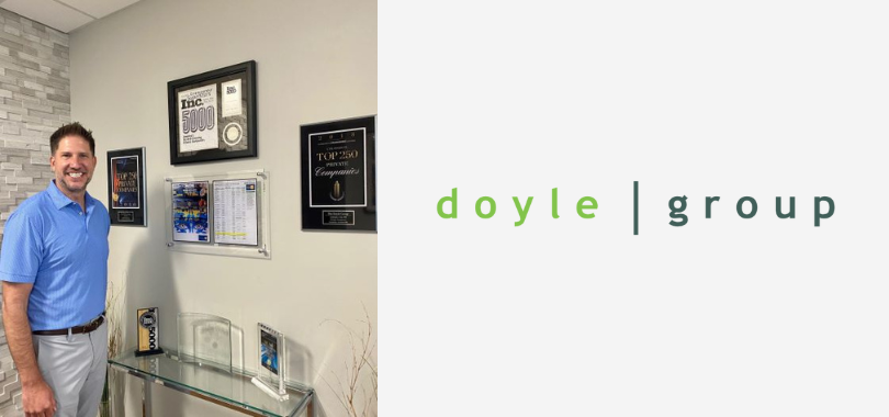 Andrew Doyle, The Doyle Group's founder stands in his office.