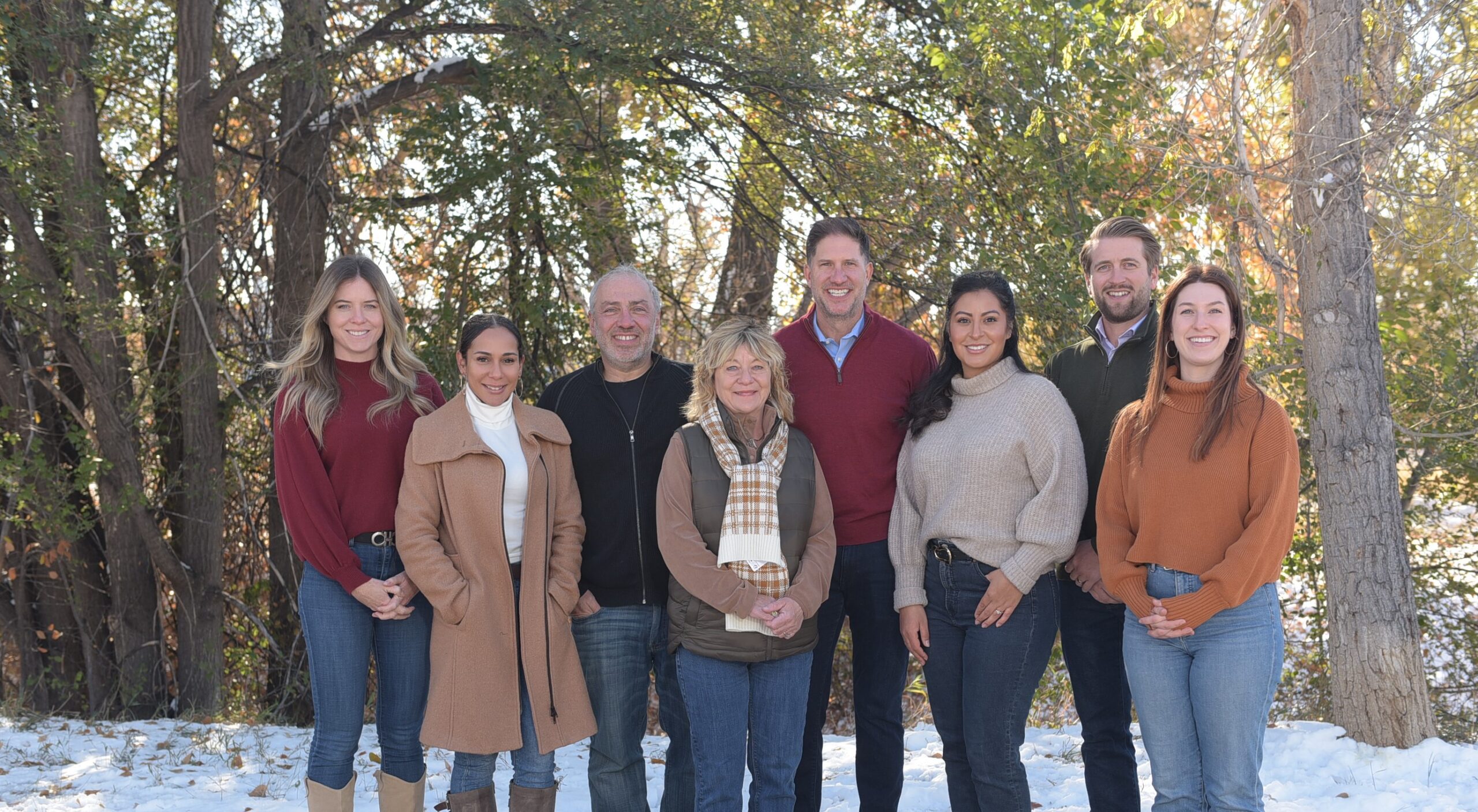 The Doyle Group Team's holiday photo shows the dynamic that made them one of the best places to work.
