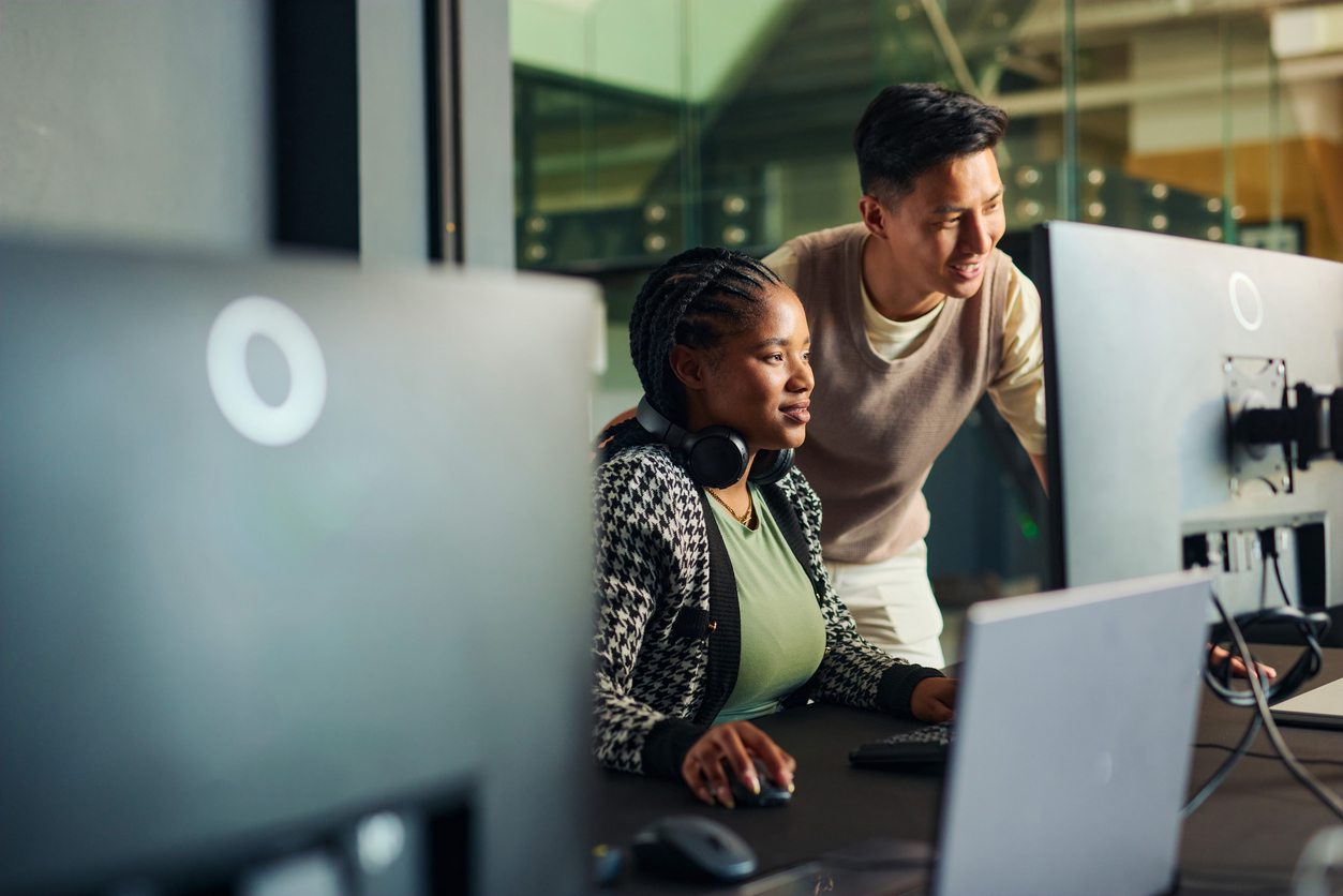 Two members of an AI workforce discuss AI strategy.